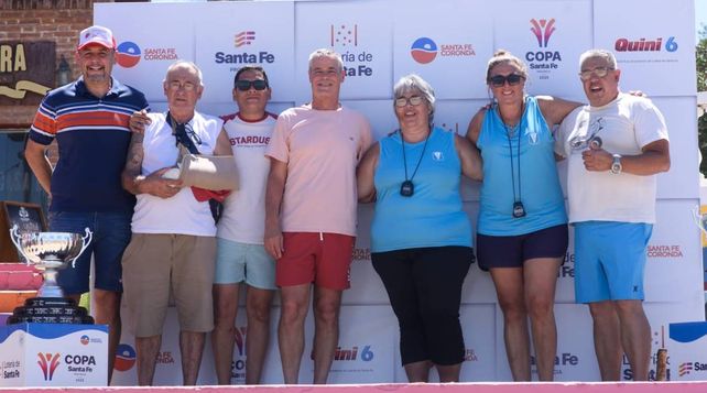 Integrantes de la AMARC, la organización, la Federación Santafesina y el municipio local en el palco de la costanera corondina.