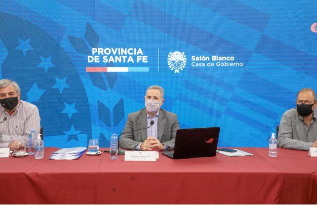 Corach (a la derecha) en una conferencia con Sain y Michlig, a quien reemplazará en el gabinete de Omar Perotti.
