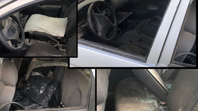 Dos de los tantos autos abandonados en la vía pública en Santa Fe.